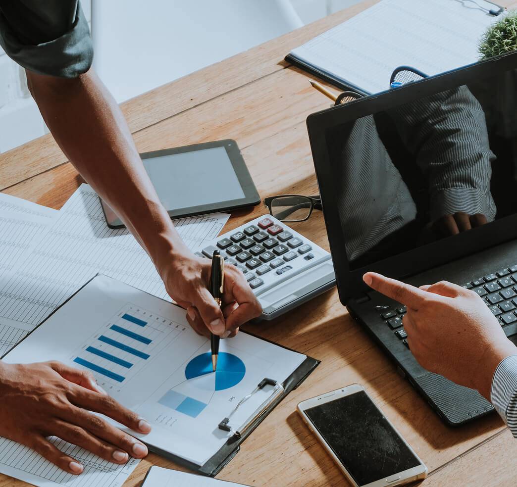 People looking at a graph