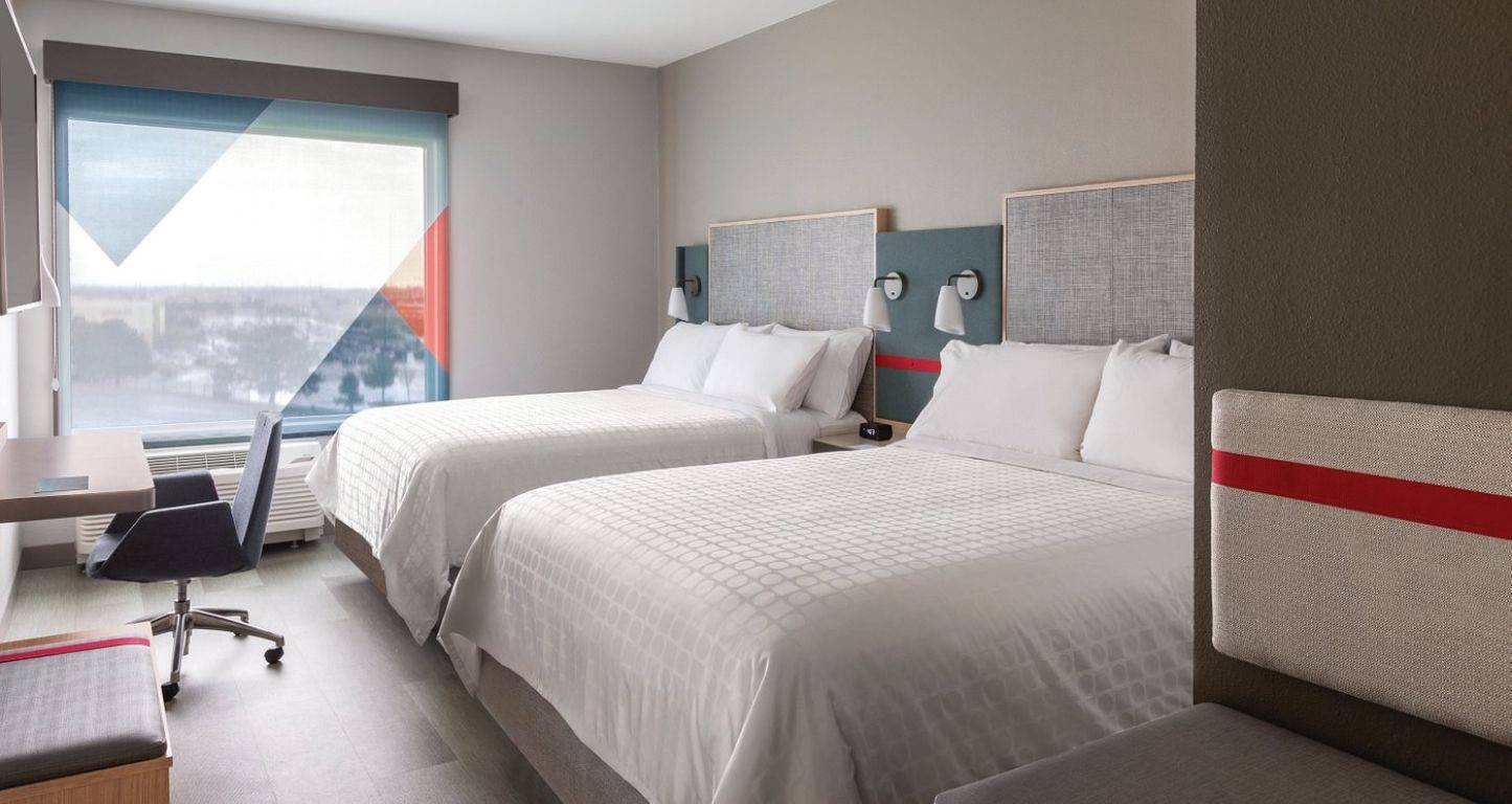 A double bed guest room at the Avid hotel