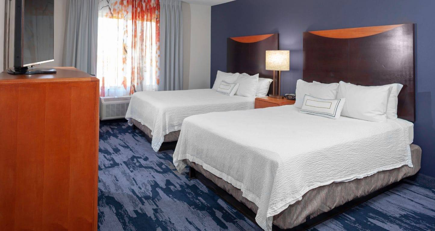 A two bed room at Fairfield Inn & Suites Charlotte Matthews