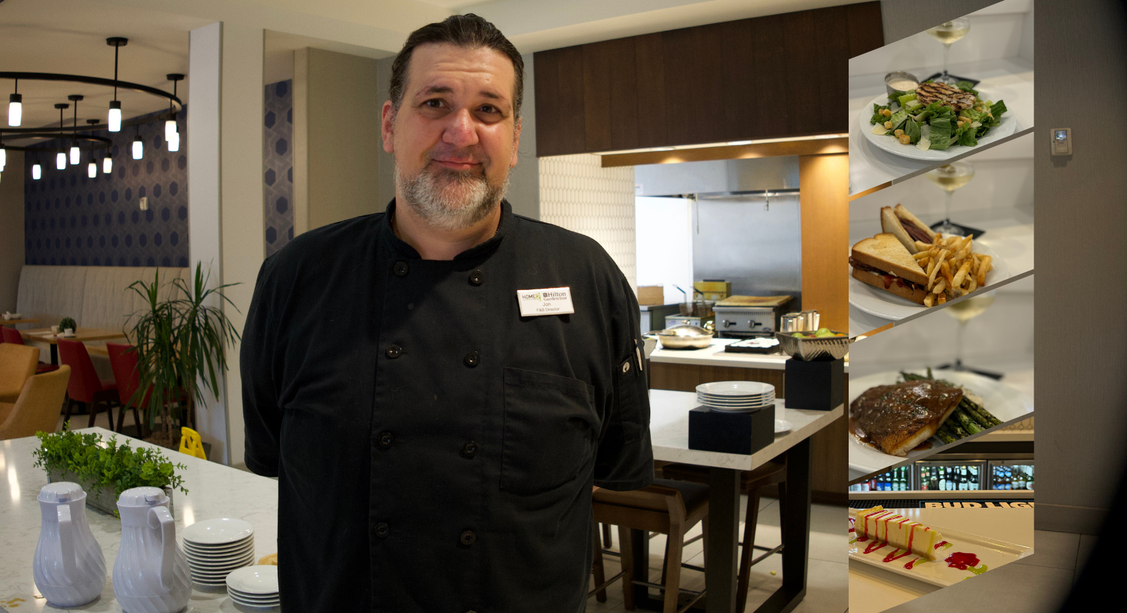 a man standing in a kitchen next to a counter