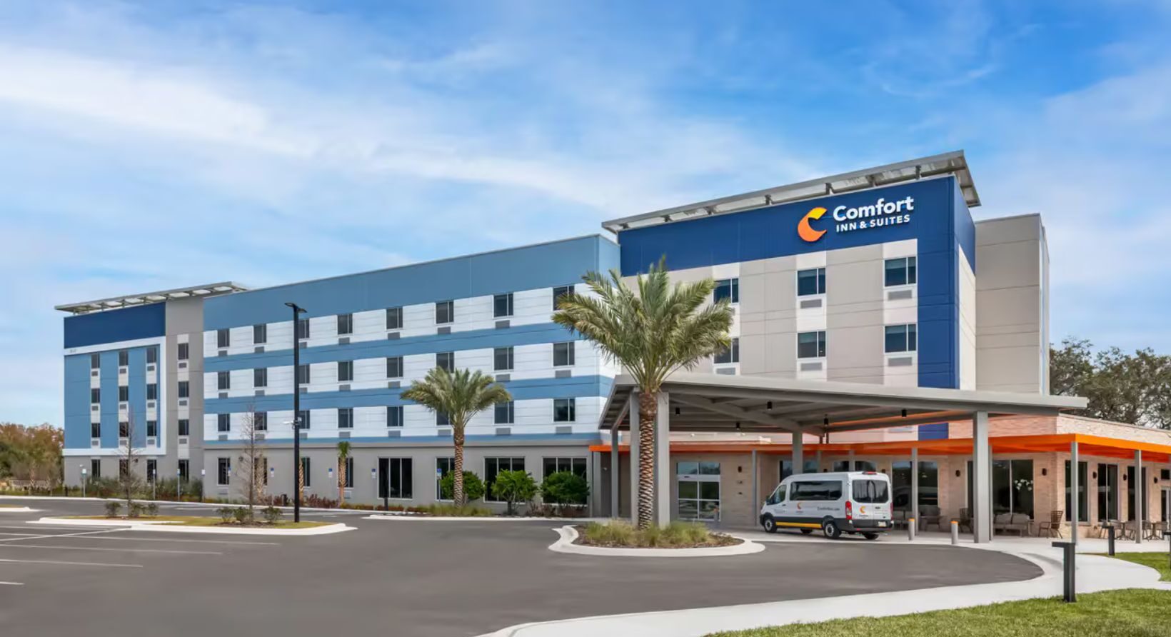Exterior cview of — Comfort Inn & Suites Orlando Sanford Airport during the day